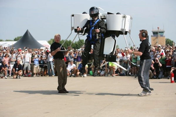 A CIVILIAN PILOT FLIES A JETPACK